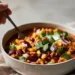 Quick 30-minute chili with beans, tomatoes, and ground meat – a warm, comforting meal for cold nights.