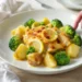 One-pan lemon chicken with potatoes and broccoli, golden and fresh, served straight from the pan.