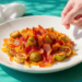 One-pan Italian sausage with bell peppers and onions, lightly caramelized and served from the skillet.