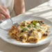 Vegetarian enchiladas with canned beans, quick to prepare and topped with melted cheese.