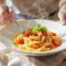 Budget-friendly quick pasta meal with noodles, simple sauce, vegetables, and affordable ingredients.
