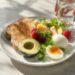 Healthy breakfast with eggs, berries, and Greek yogurt — quick no-added-sugar morning meal ideas