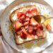 Healthy breakfast toast ideas with yogurt, nut butter, and veggie toppings on whole grain bread