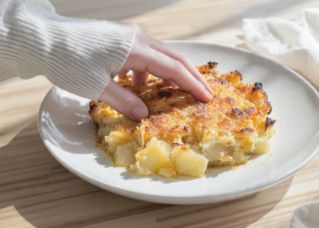 Potato and Gruyère gratin, creamy vegetarian bake with a golden, cheesy top.