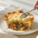 Vegetarian shepherd’s pie with lentils and vegetables, topped with mashed potatoes and baked until golden.