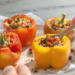 Vegetarian stuffed peppers with quinoa and vegetables, colorful, healthy, and quick to prepare.