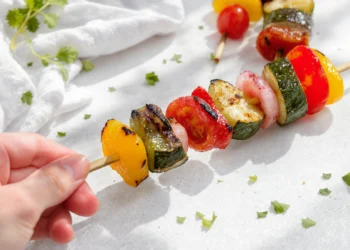 Grilled veggie kabobs with bell peppers, zucchini, and mushrooms on skewers — easy summer vegetable recipe